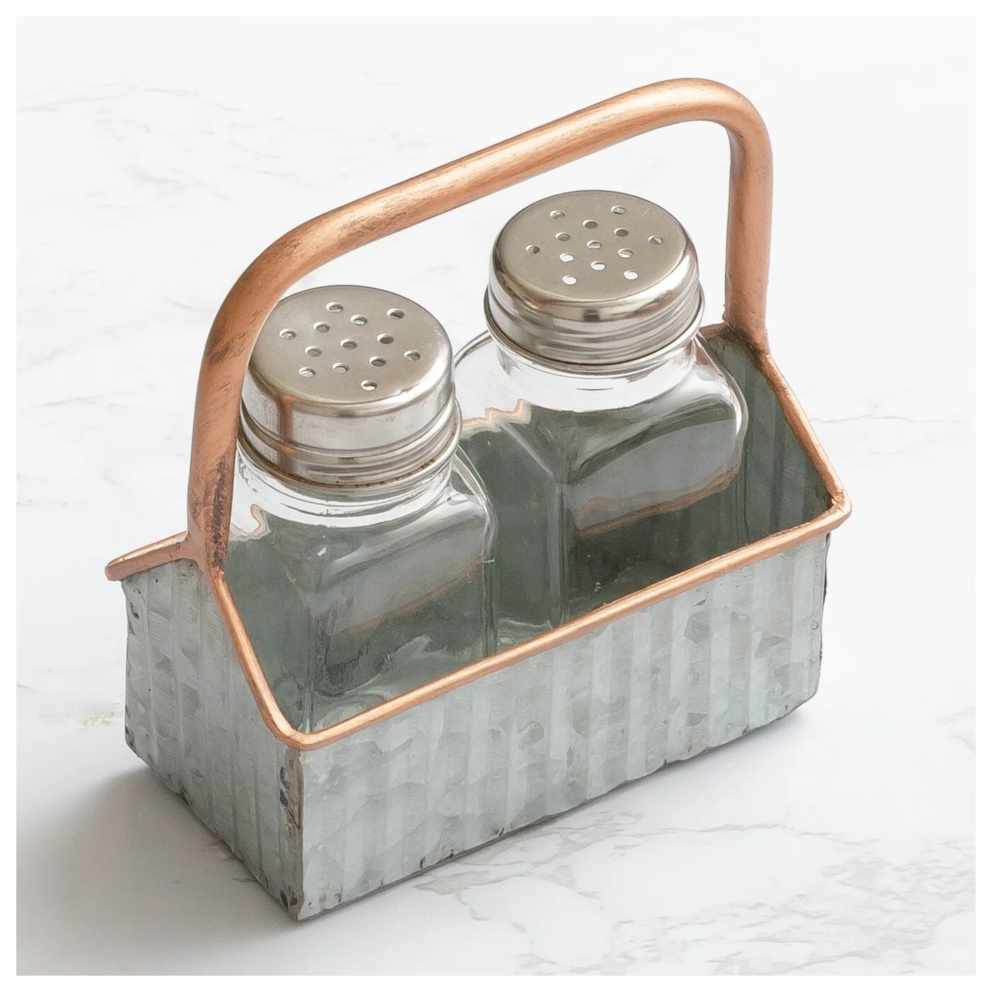 Salt And Pepper Shakers In Corrugated Metal Caddy