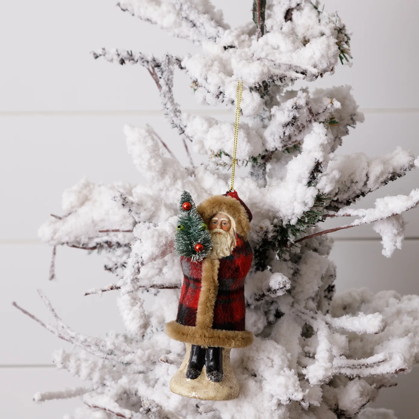 Plaid Belsnickle Santa Holding Tree Ornament
