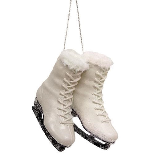 Pair of Figure Skates With Fuzzy Top Hanging